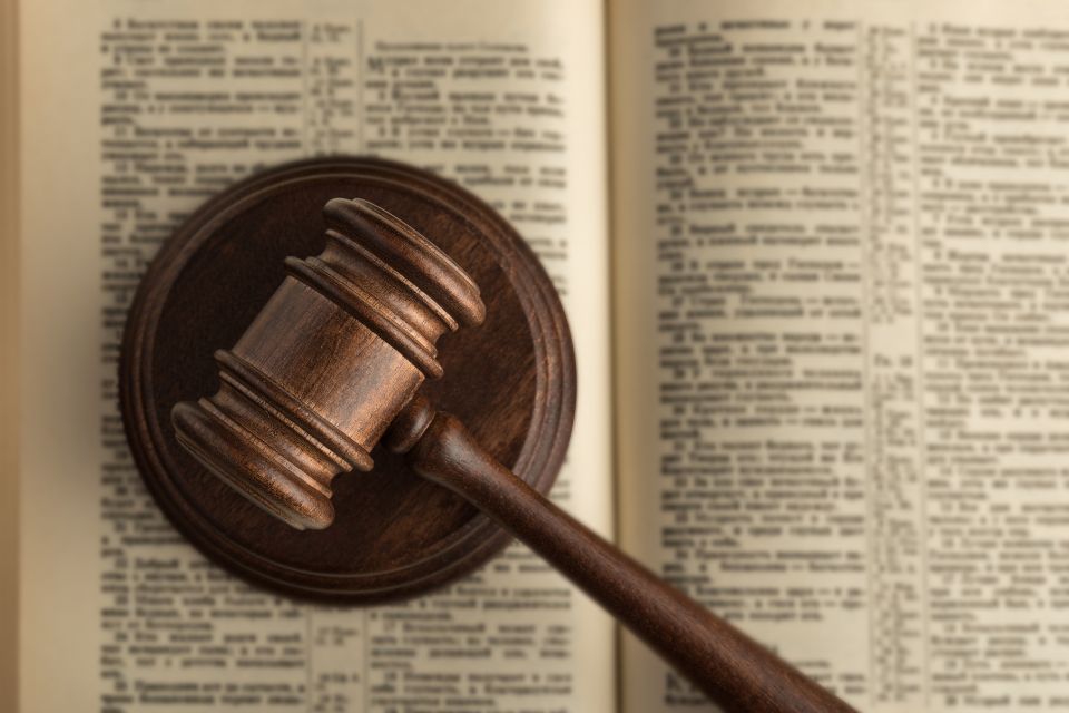 A gavel on an open book