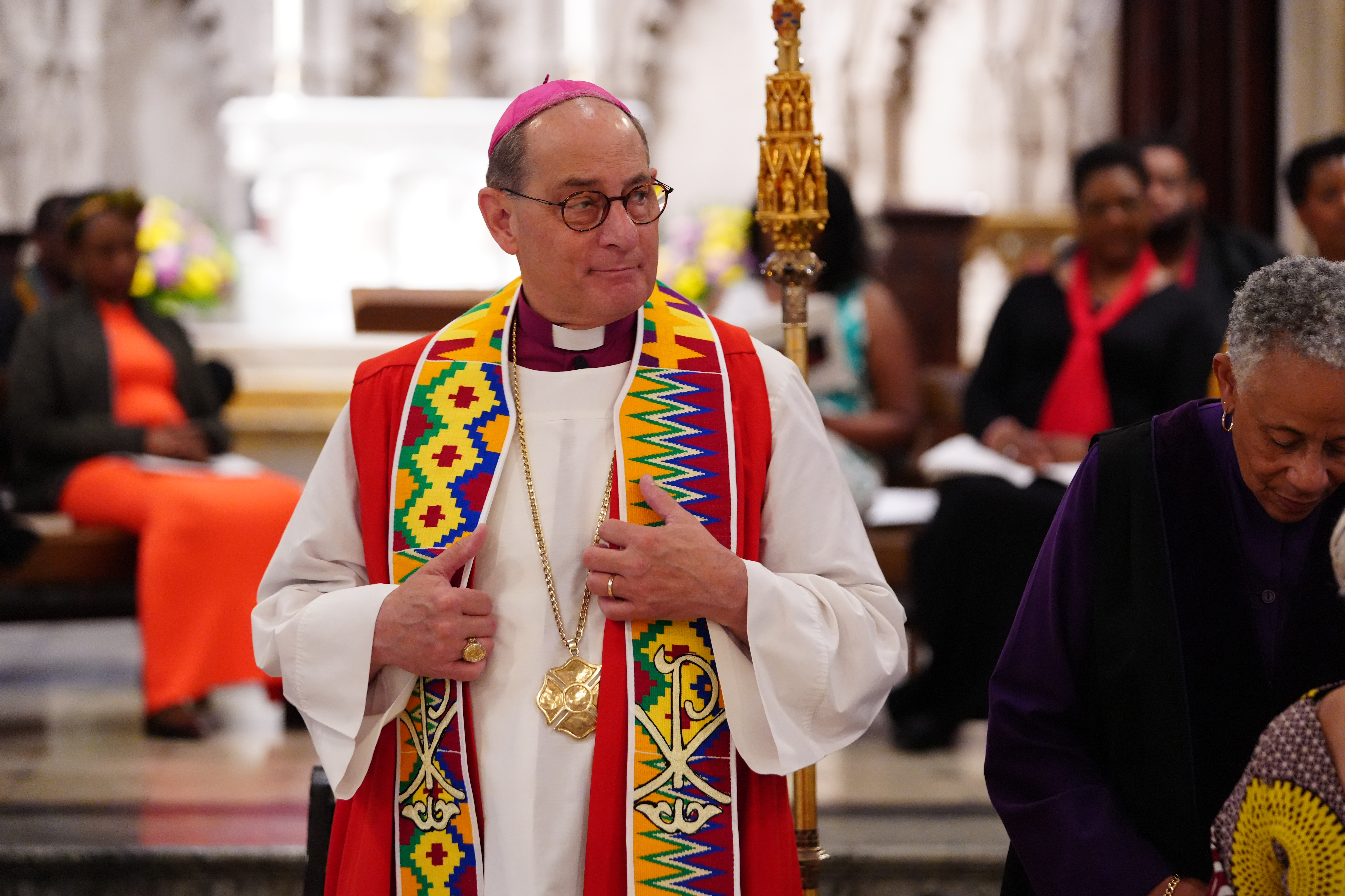 Bishop Provenzano stands at the Juneteenth Jubilee