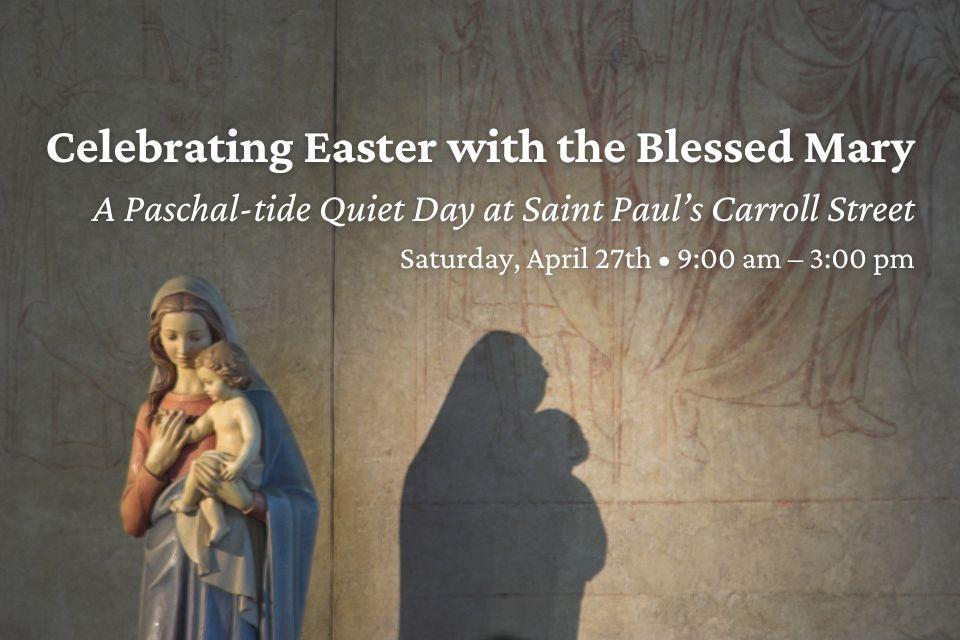 A picture of a statue of Mary holding the baby Jesus, a dark shadow appears on a wall behind them.