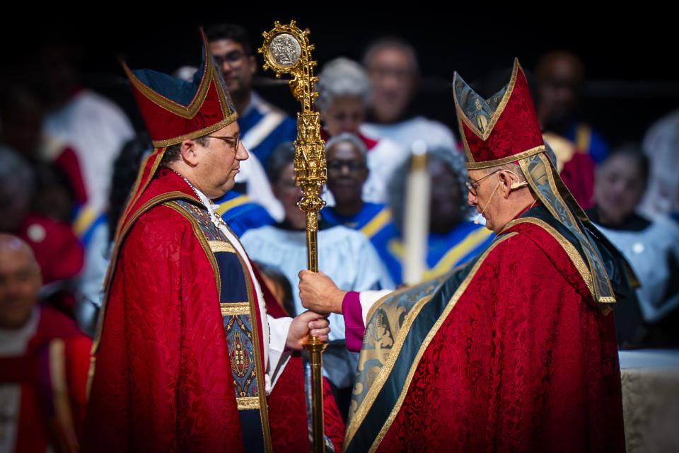 Bishop Shoemaker handed the diocesan crozier by Bishop Provenzano