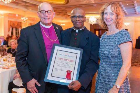 Fr. Tiller poses with Bishop Provenzano and Mary Beth Welsh at the 2025 Celebration of Ministry