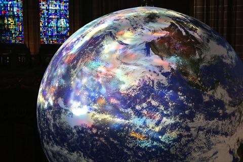 Gaia with reflections of stained glass