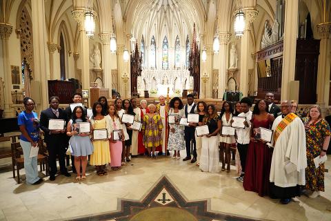 Scholars and the members of the reparations committee gather