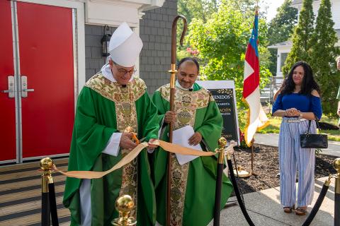 Bishop Provenzano cuts the ribbon in front of Iglesia San Francisco 